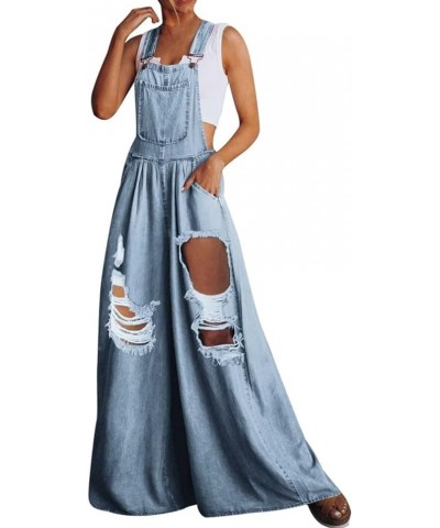 Women's Casual Loose Denim Overalls Adjustable Strap Wide Leg Bib Jean Overalls Jumpsuit with Pockets Ripped Light Blue $20.3...