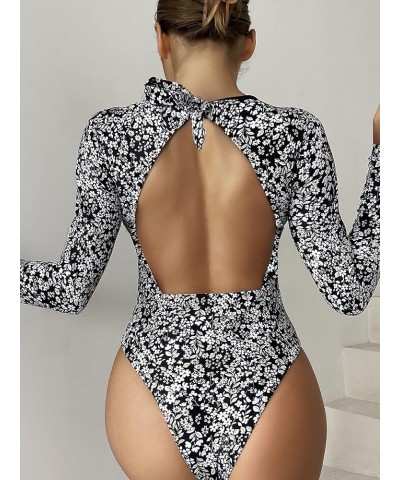 Women's Tropical Long Sleeve One Piece Swimsuit Cut Out Cirss Cross Back Bathing Suit Black and White a $17.28 Swimsuits