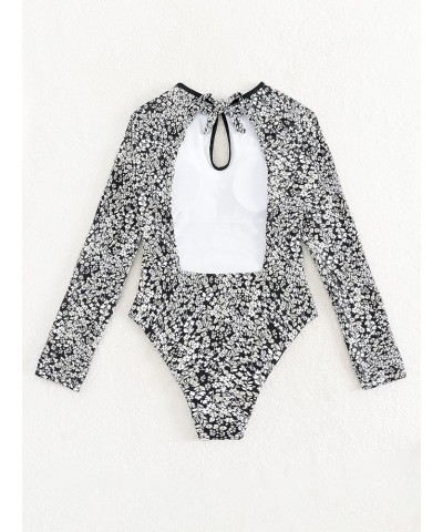 Women's Tropical Long Sleeve One Piece Swimsuit Cut Out Cirss Cross Back Bathing Suit Black and White a $17.28 Swimsuits